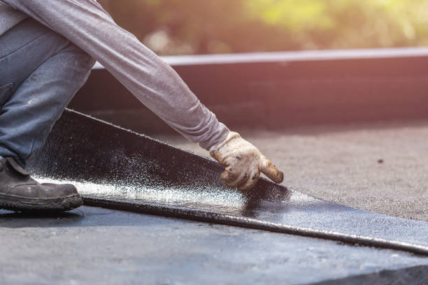 Professional Waterproofing technician working in Alpine, NJ